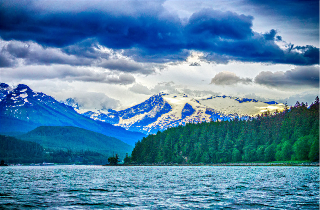 Cruise balcony overlooking Alaskan mountains